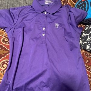 Purple golf tee